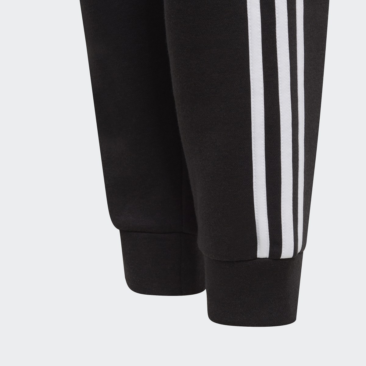 Adidas Essentials 3-Stripes Joggers. 5