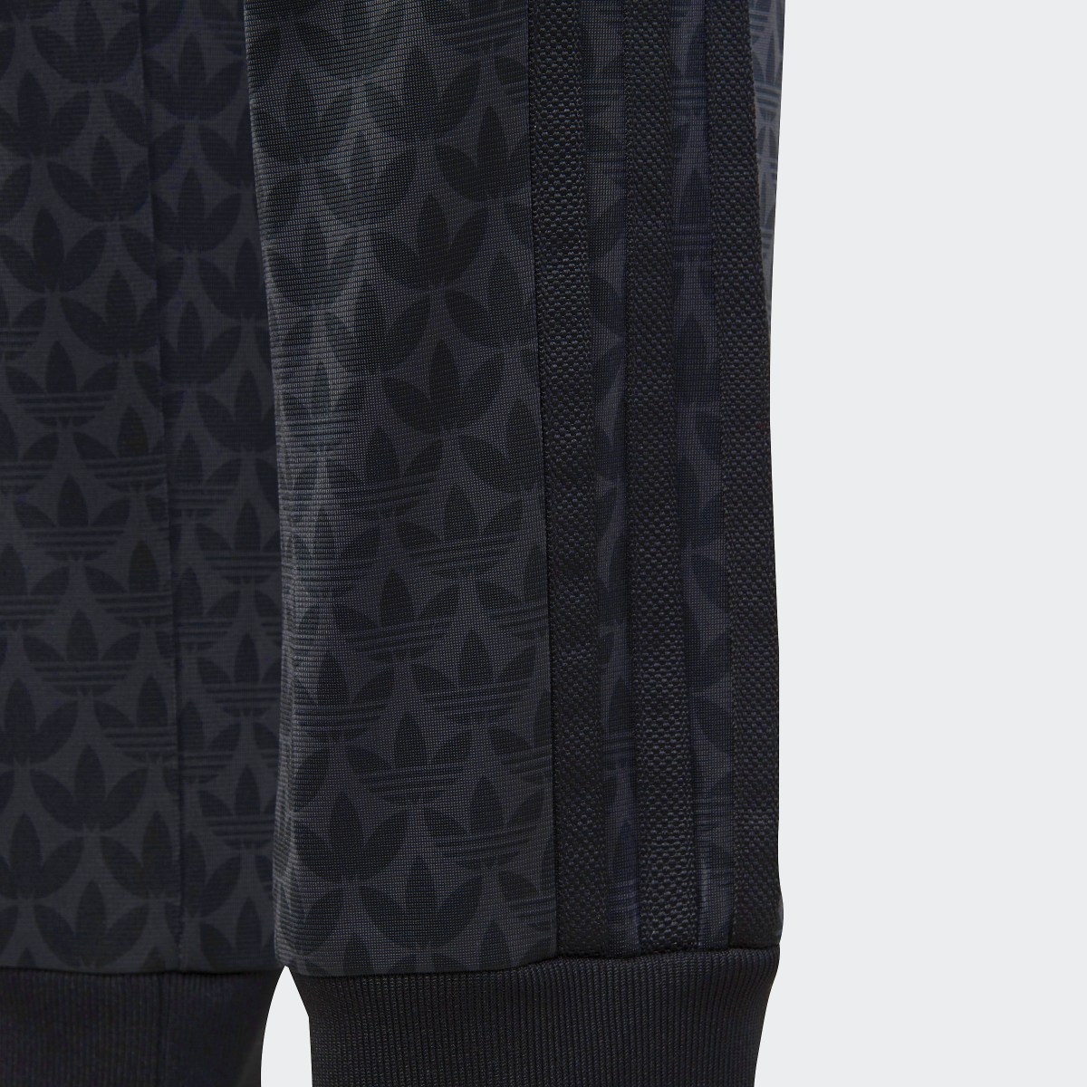 Adidas Monogram Print Track Pants. 6