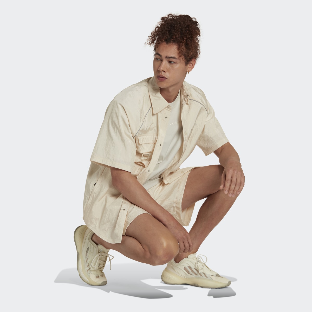 Adidas Short mix de matières Reveal. 4