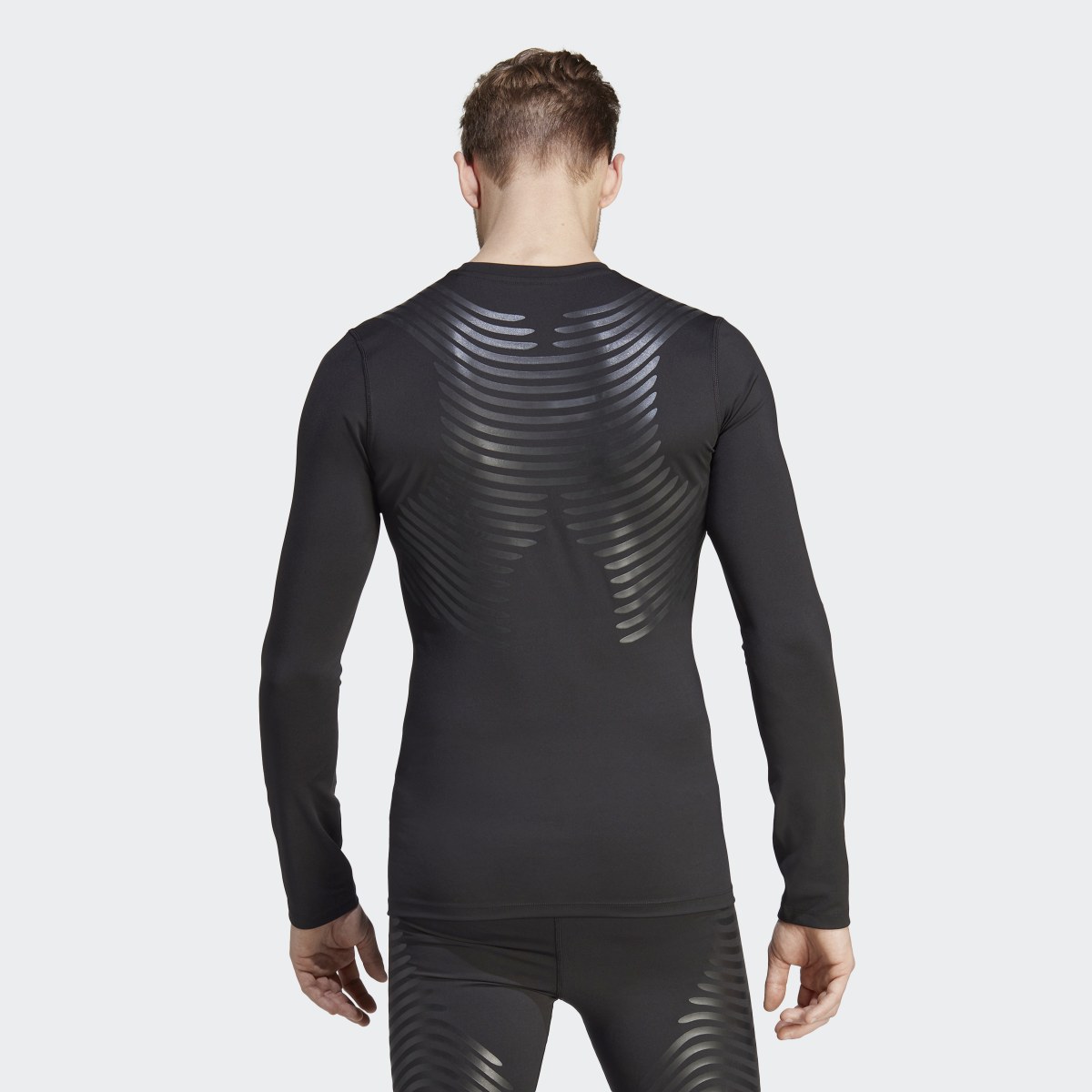 Adidas Camisola Techfit Control x RHEON™. 4