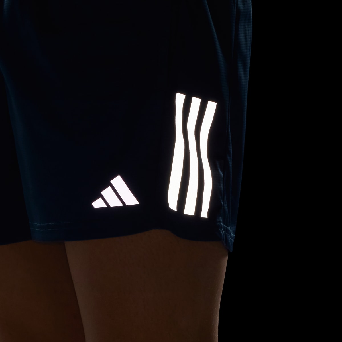 Adidas Own the Run Carbon Measured Shorts. 6