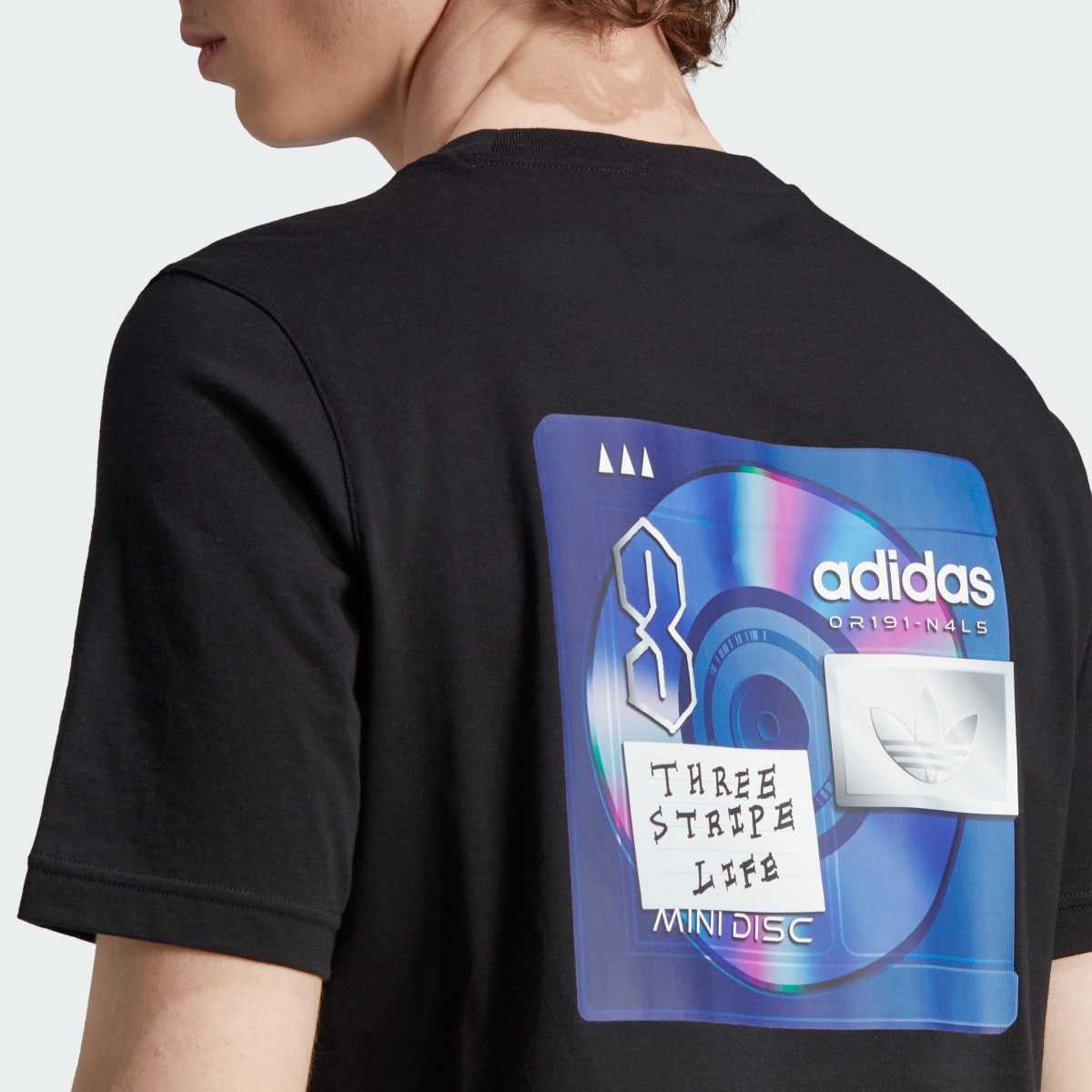 Adidas Mini Disc Back Graphic Tee. 7