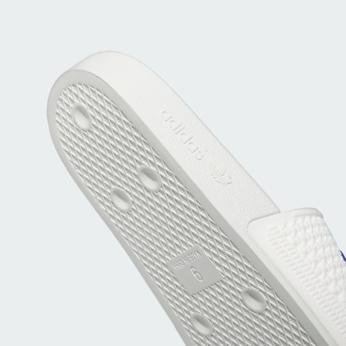 Adidas Shmoofoil Slides. 10