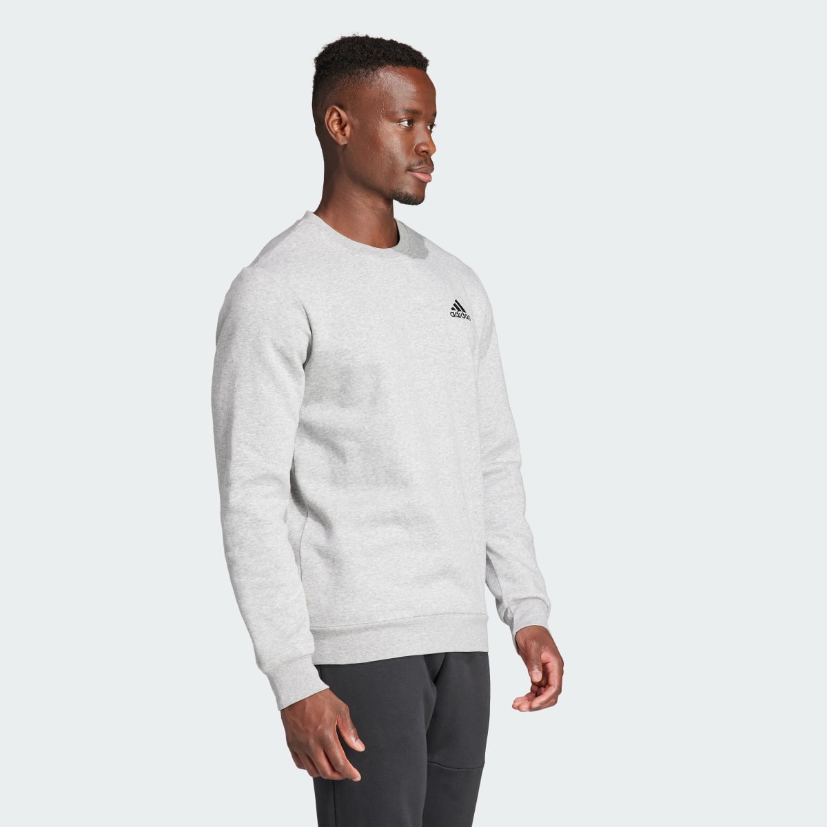 Adidas FEELCOZY ESSENTIALS FLEECE SWEATSHIRT. 4