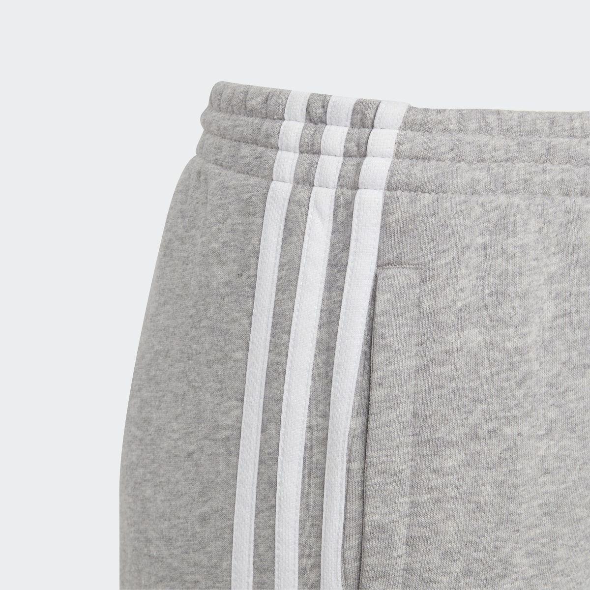 Adidas Essentials 3-Stripes Fleece Joggers. 6