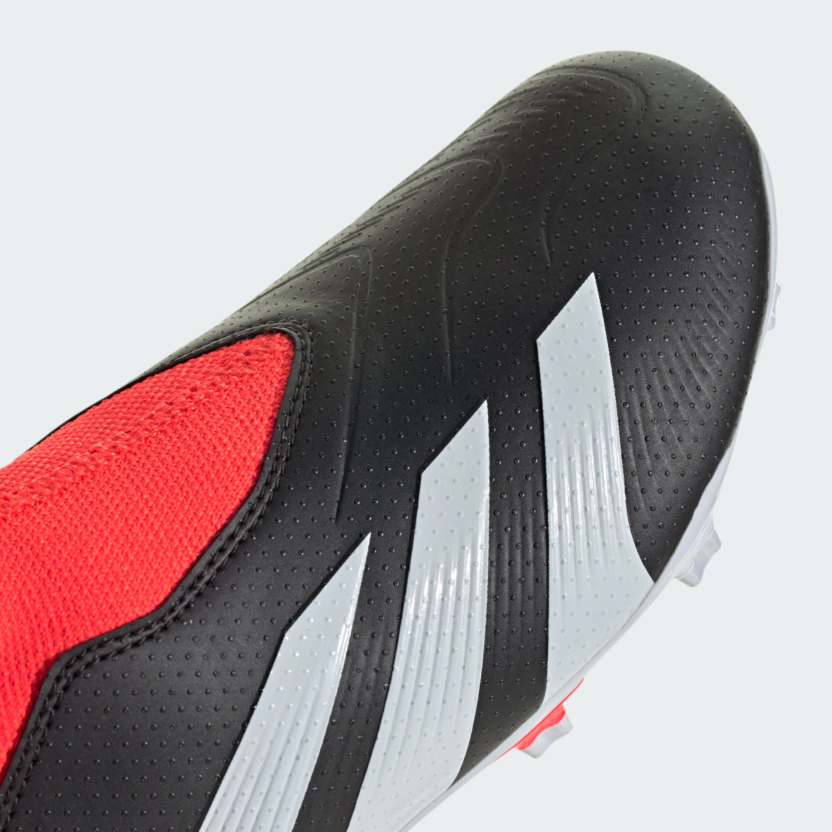 Adidas Calzado de fútbol Predator 24 League Terreno Firme Sin Cordones. 10
