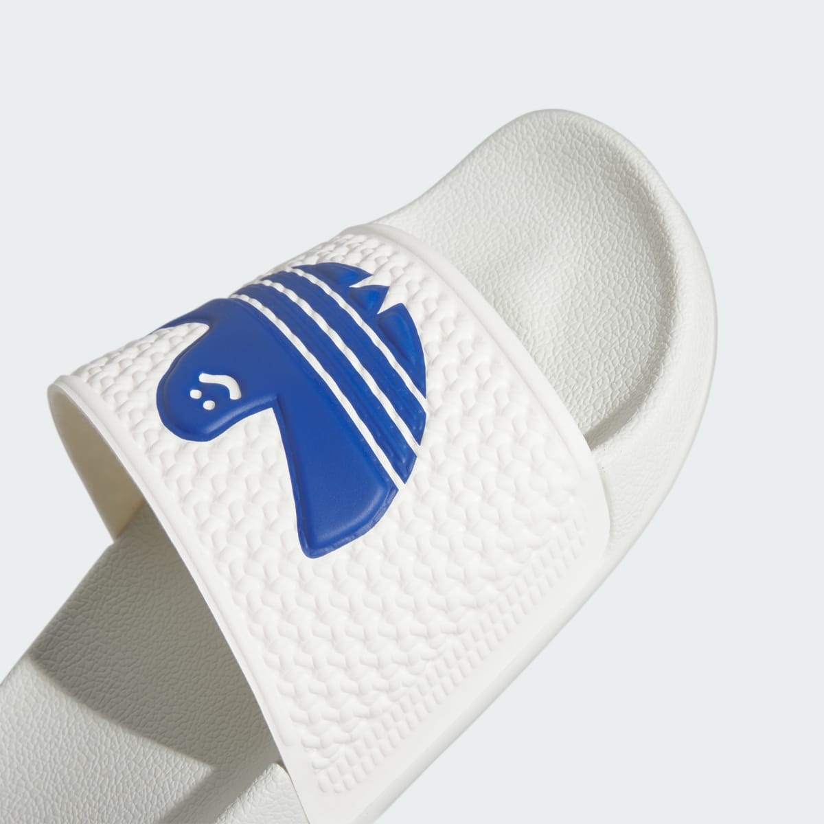 Adidas Shmoofoil Slides. 9