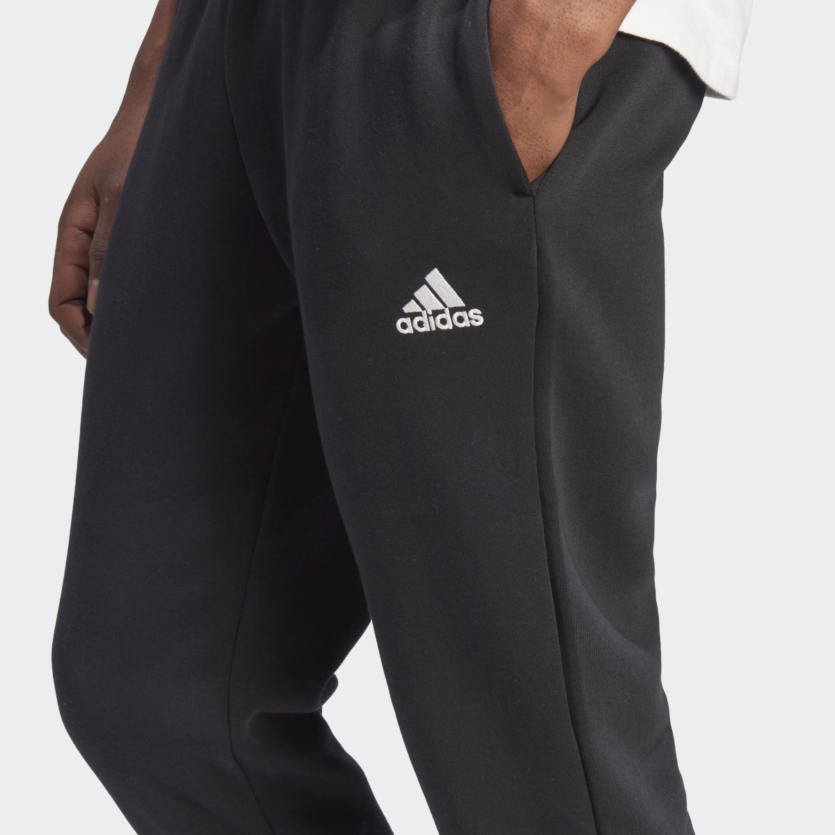 Adidas Essentials Fleece Tapered Cuffed Pants. 5