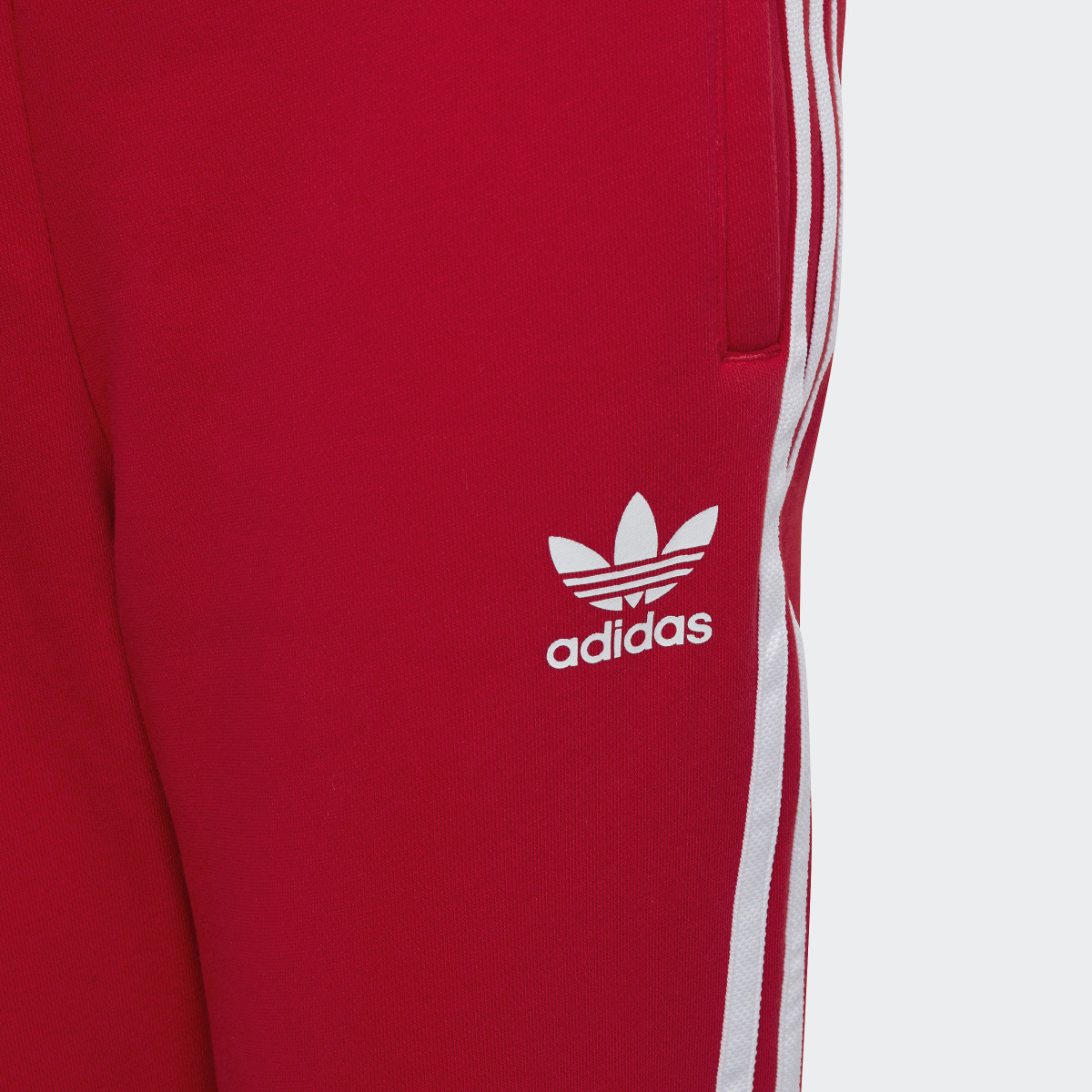 Adidas Pantalón 3 bandas. 6