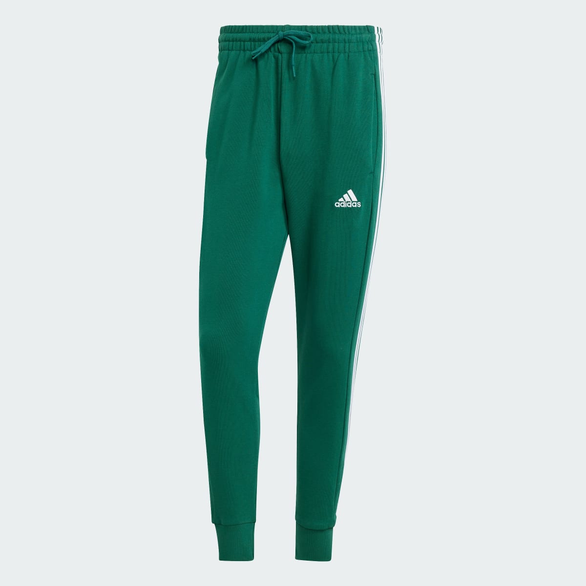 Adidas Pantaloni Essentials French Terry Tapered Cuff 3-Stripes. 4