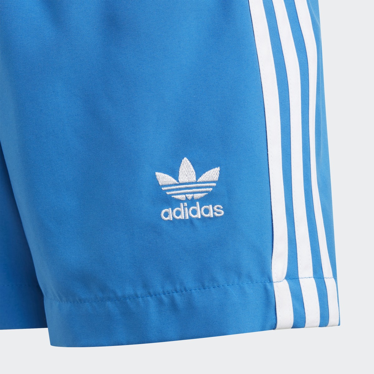Adidas Originals adicolor 3-Streifen Badeshorts. 5