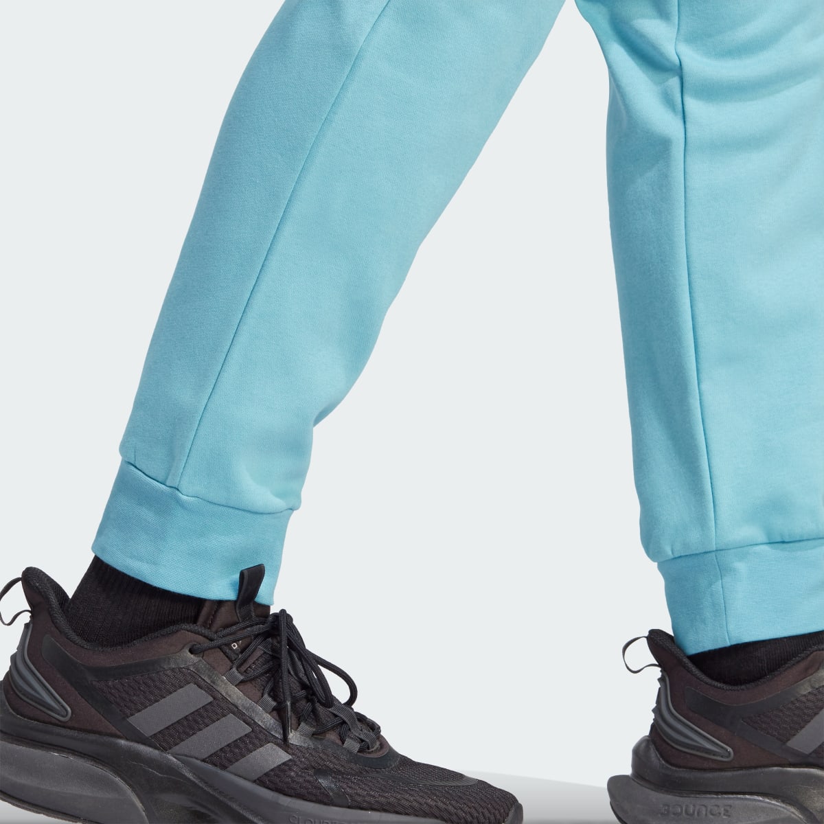 Adidas Pantaloni Essentials Fleece Regular Tapered. 6