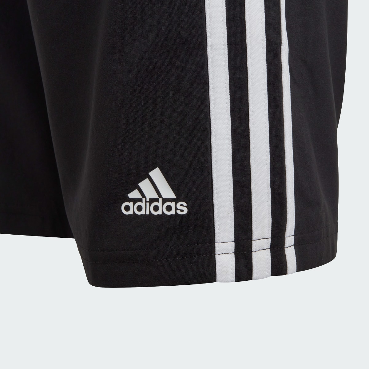 Adidas Short toile Essentials 3-Stripes. 5