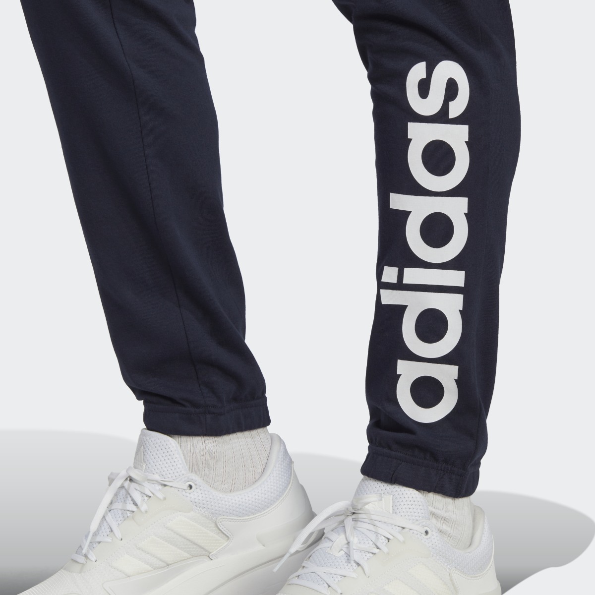Adidas Essentials Single Jersey Tapered Elasticized Cuff Logo Hose. 6