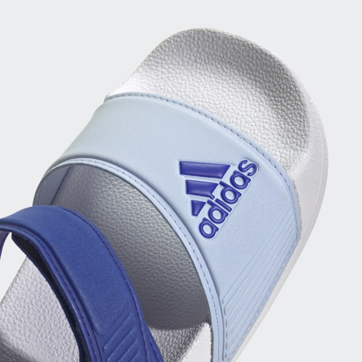 Adidas Adilette Sandals. 9
