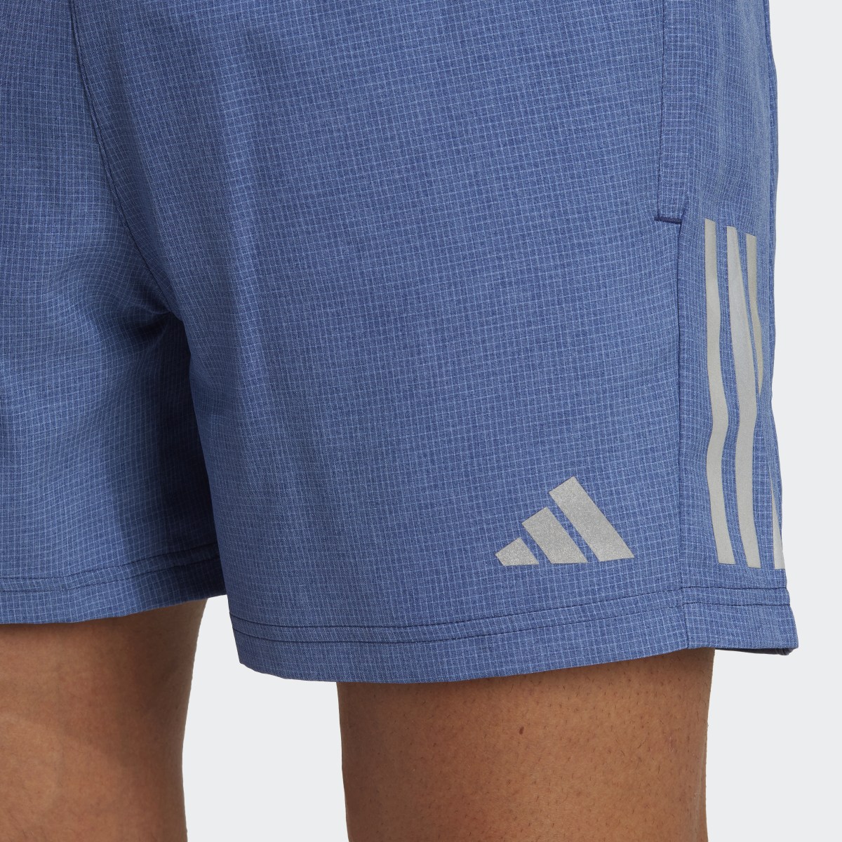 Adidas Own the Run Heather Shorts. 6