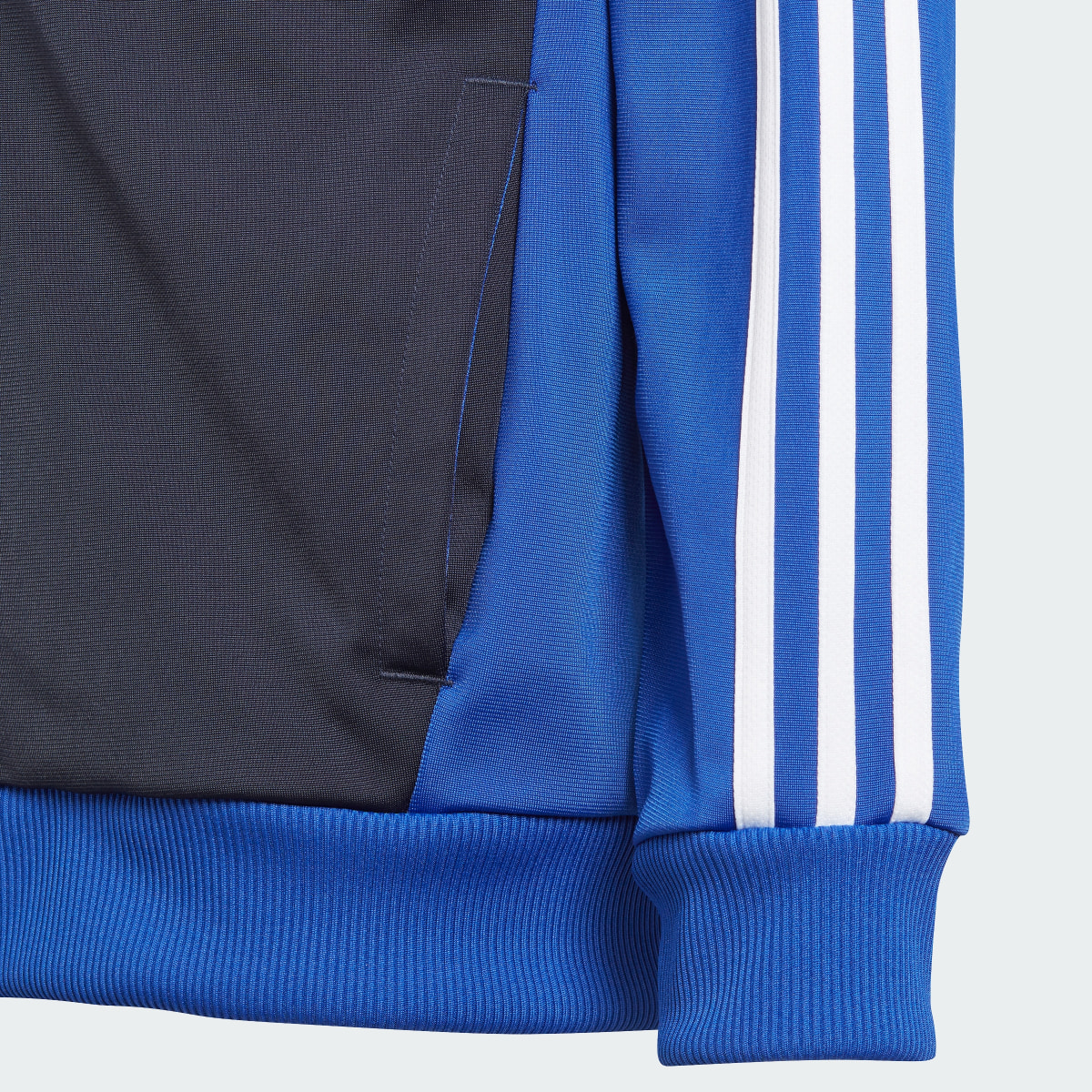 Adidas Essentials 3-Stripes Tiberio Track Suit. 10