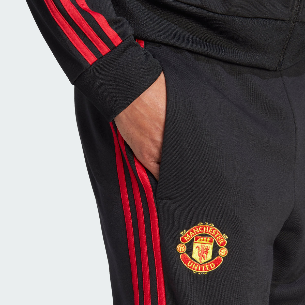 Adidas Spodnie dresowe Manchester United DNA. 6