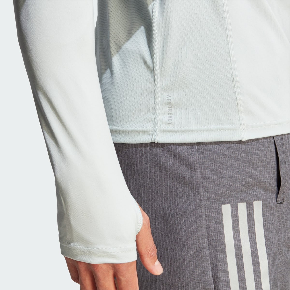 Adidas Own the Run 1/4 Zip Long Sleeve Sweatshirt. 6