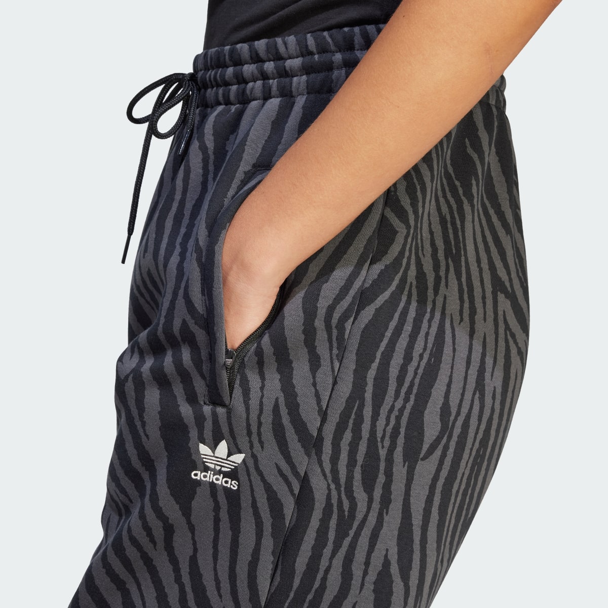 Adidas Allover Zebra Animal Print Essentials Joggers. 5