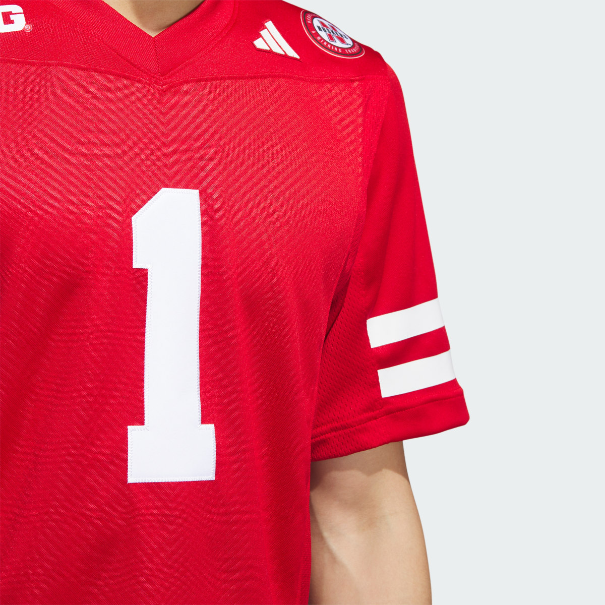 Adidas Nebraska Football Off-Field Home Jersey. 6