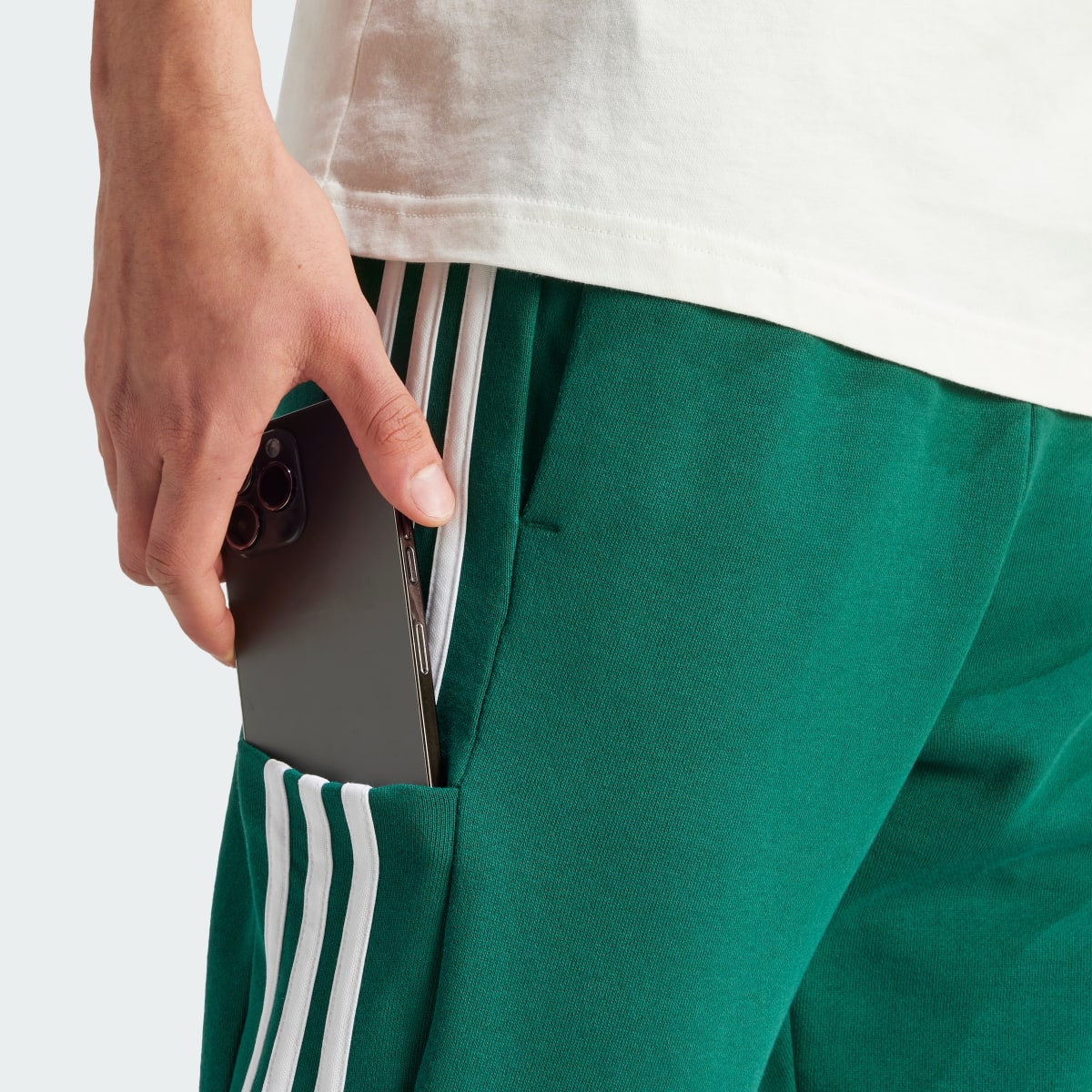 Adidas Pantalon fuselé en molleton Essentials Cuff 3-Stripes. 6