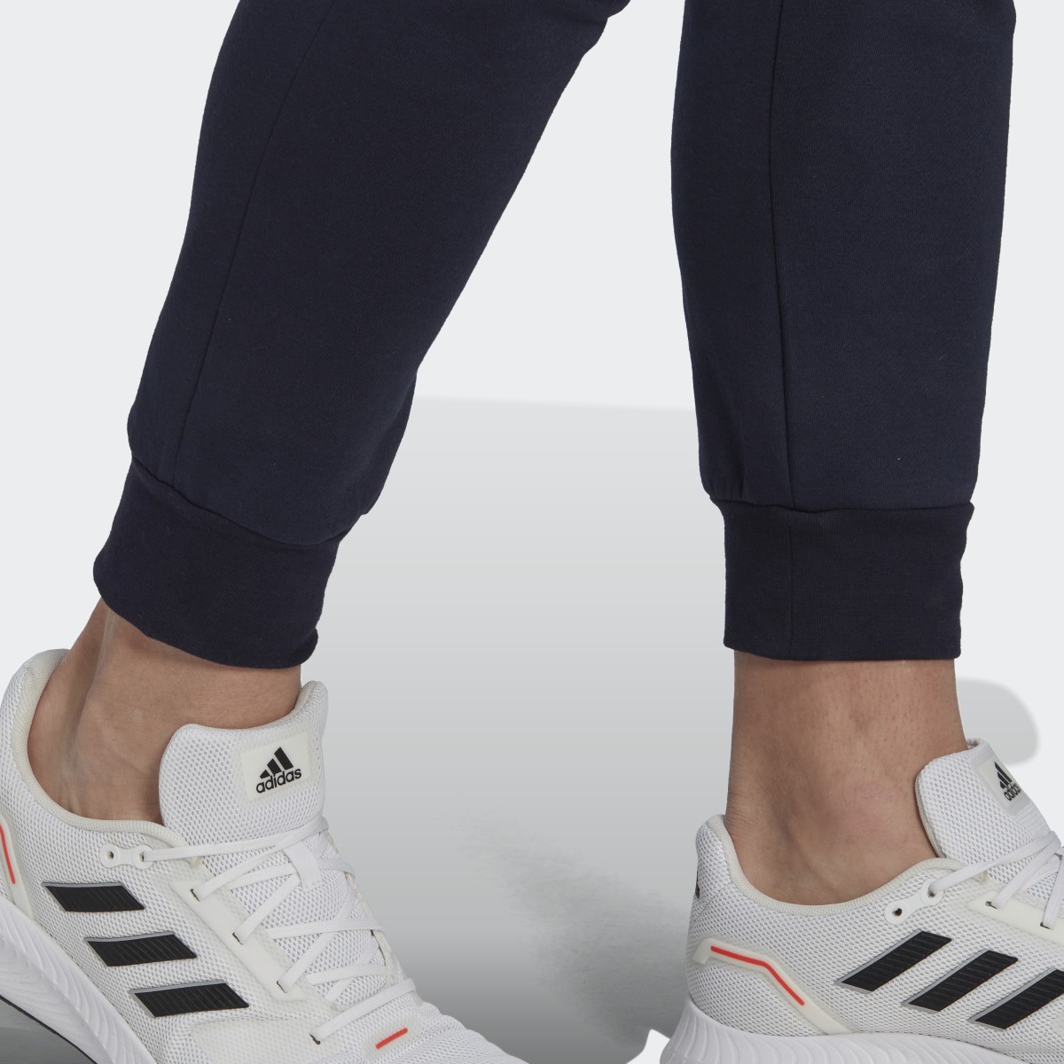 Adidas Essentials Fleece Regular Tapered Pants. 6