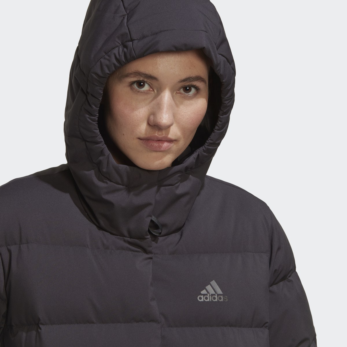 Adidas Chaqueta de plumón con capucha Helionic. 8