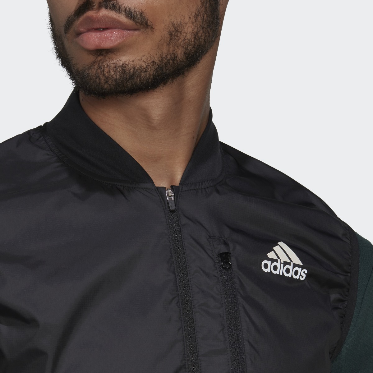 Adidas Own the Run Vest. 7