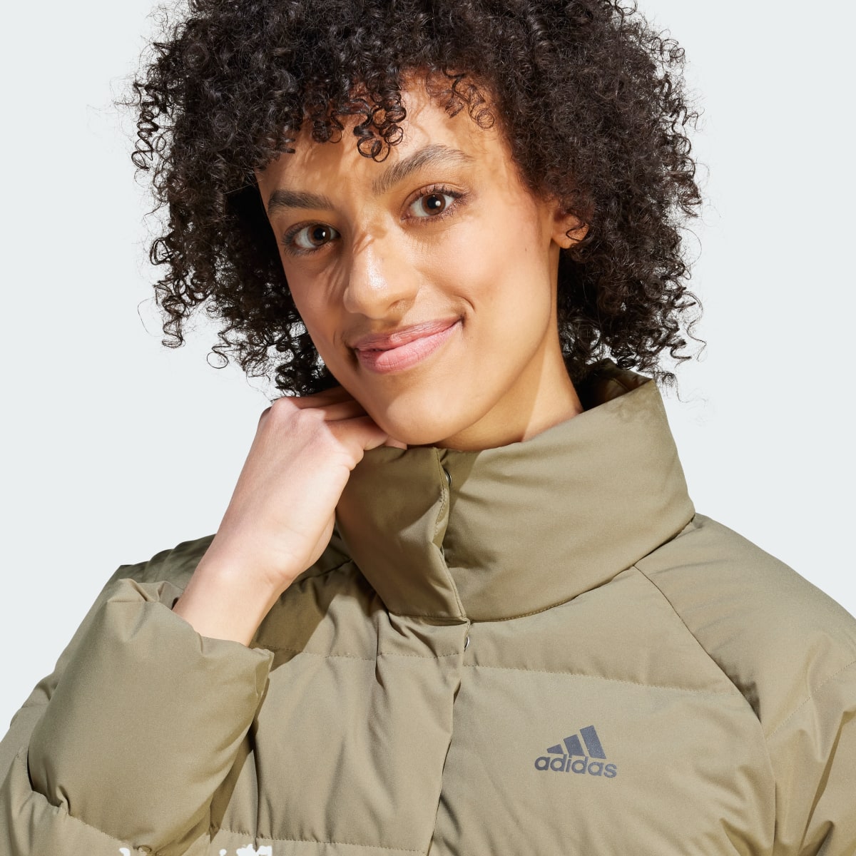 Adidas Chaqueta de plumón Helionic Relaxed. 6