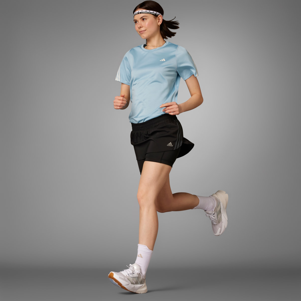 Adidas Jupe-short de running Run Icons 3 bandes. 10