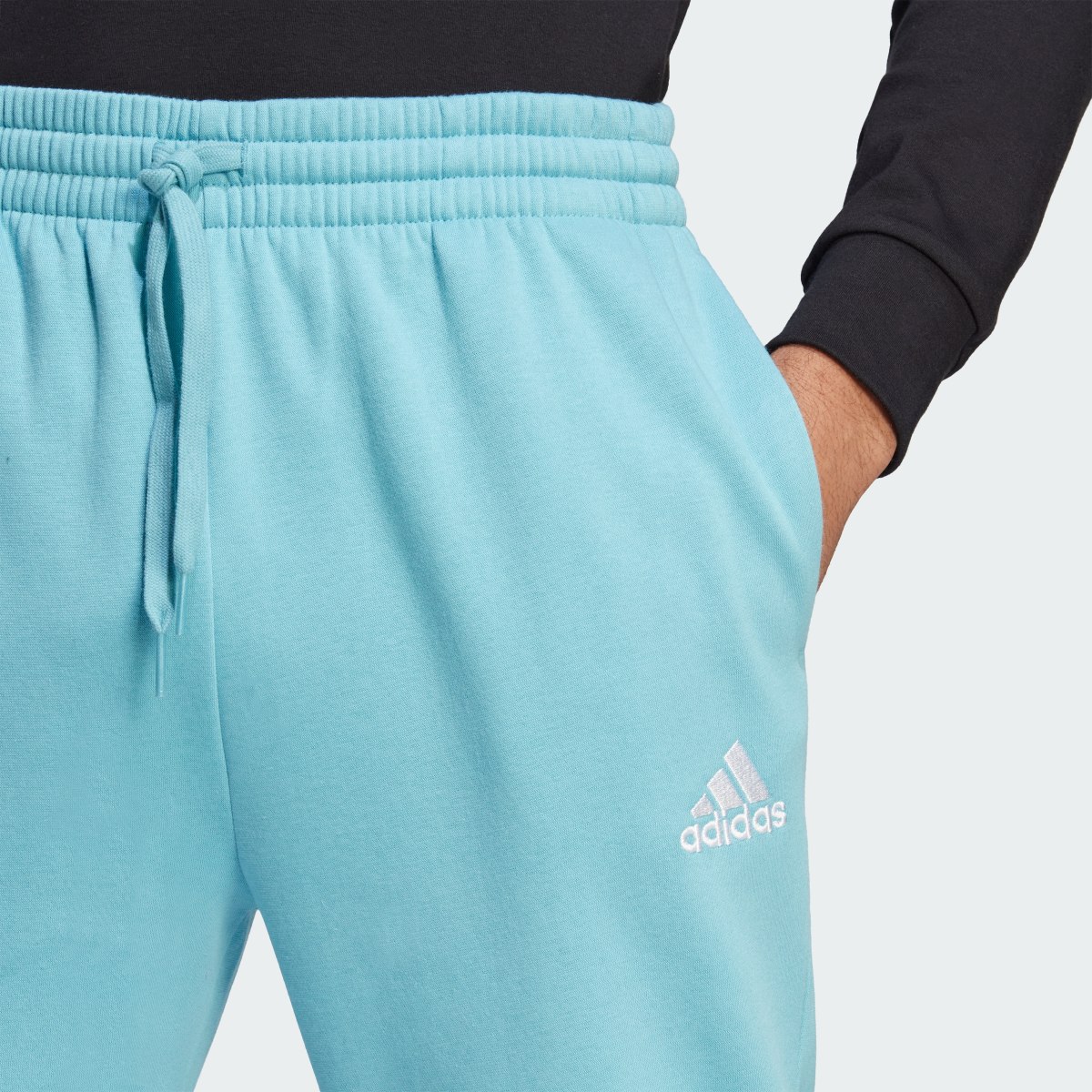 Adidas Essentials Fleece Regular Tapered Pants. 5
