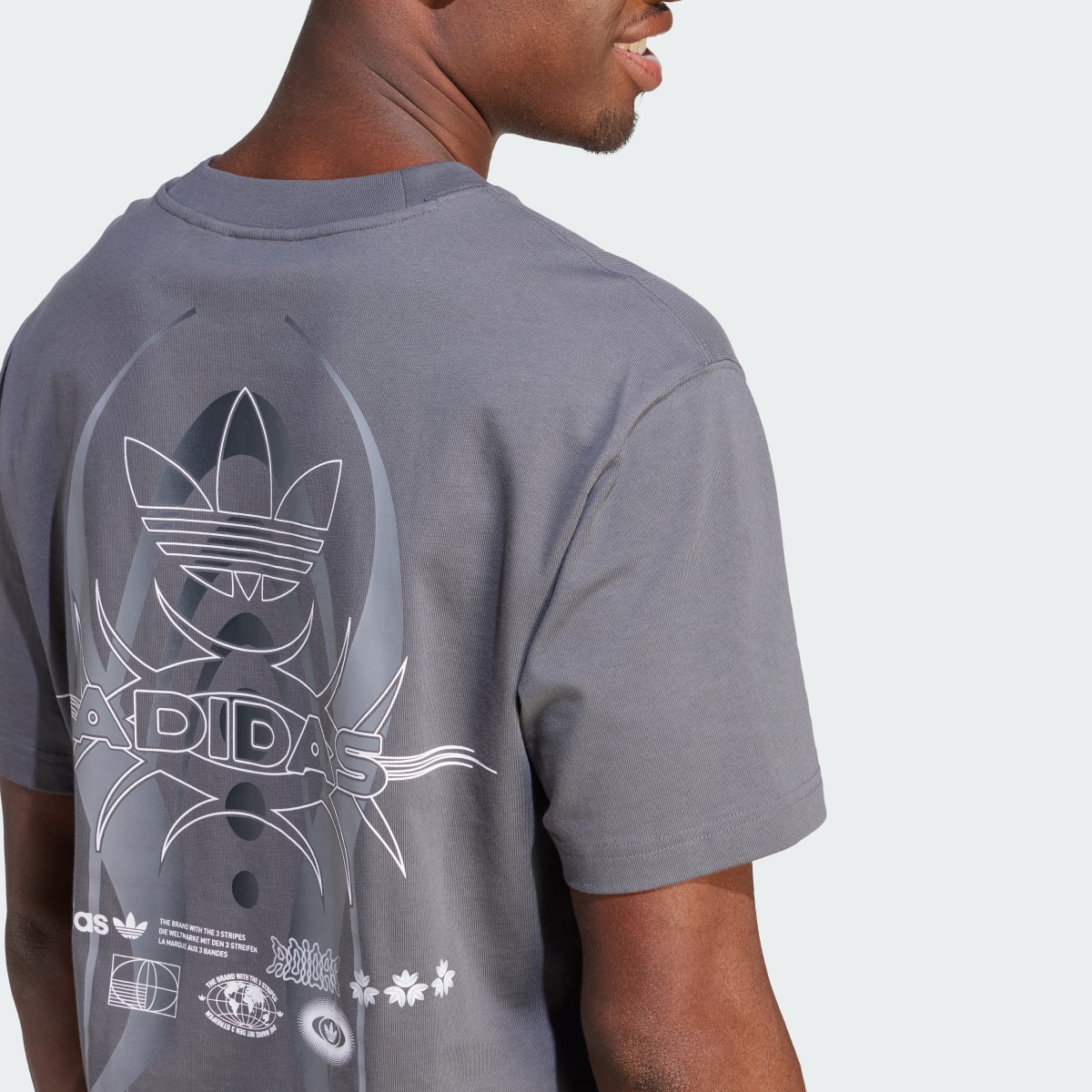 Adidas Rekive Graphic Tee. 6