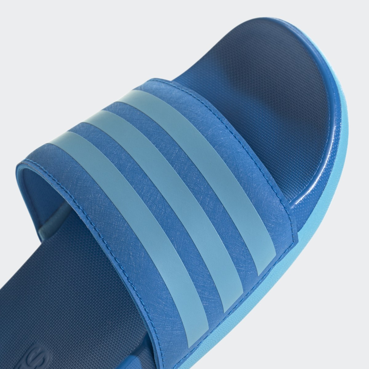 Adidas adilette Comfort Slides. 9