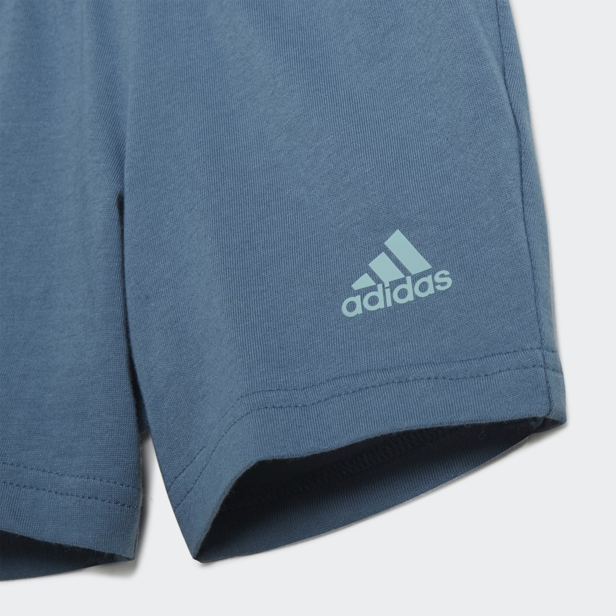 Adidas Conjunto Playera y Shorts Essentials. 9