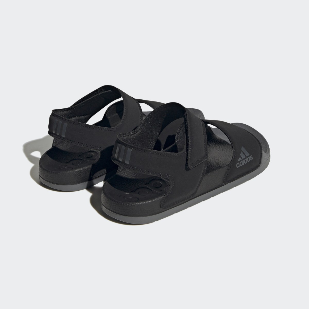 Adidas Adilette Sandals. 6