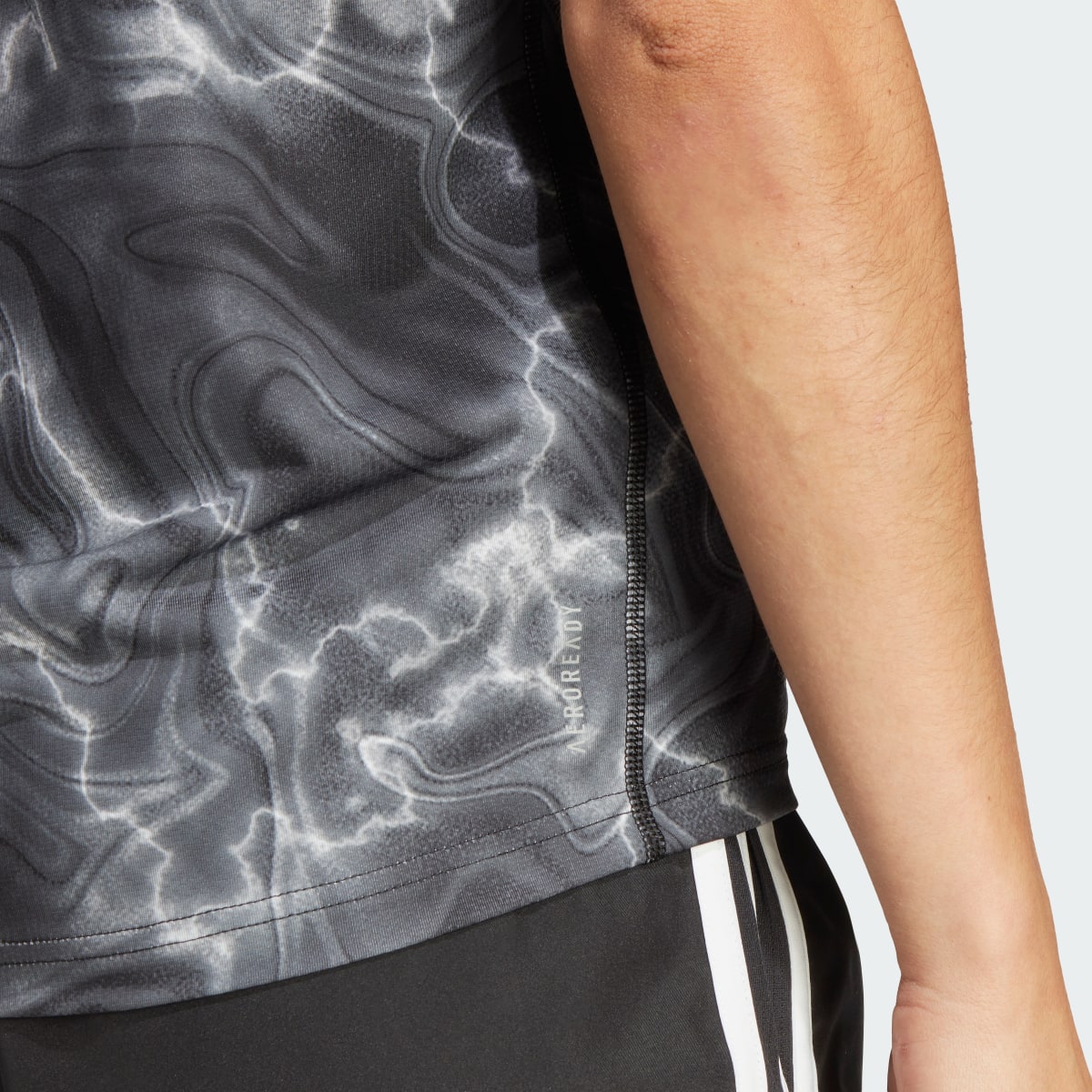 Adidas Own the Run Allover Print Tee. 6