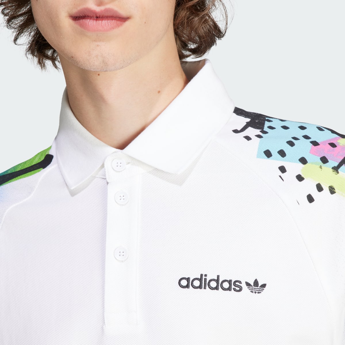 Adidas Polo rétro graphique. 6