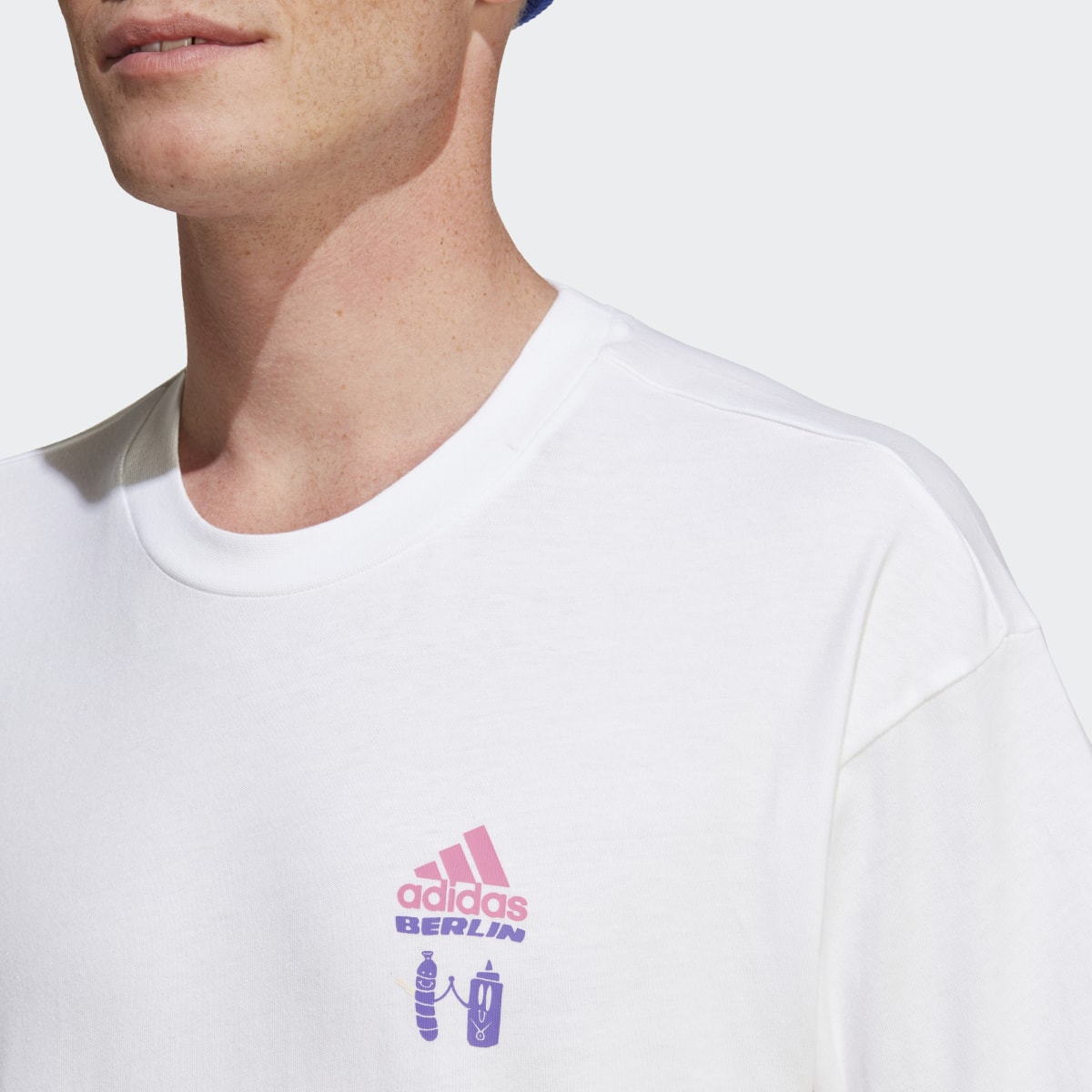 Adidas Graphic T-Shirt. 5