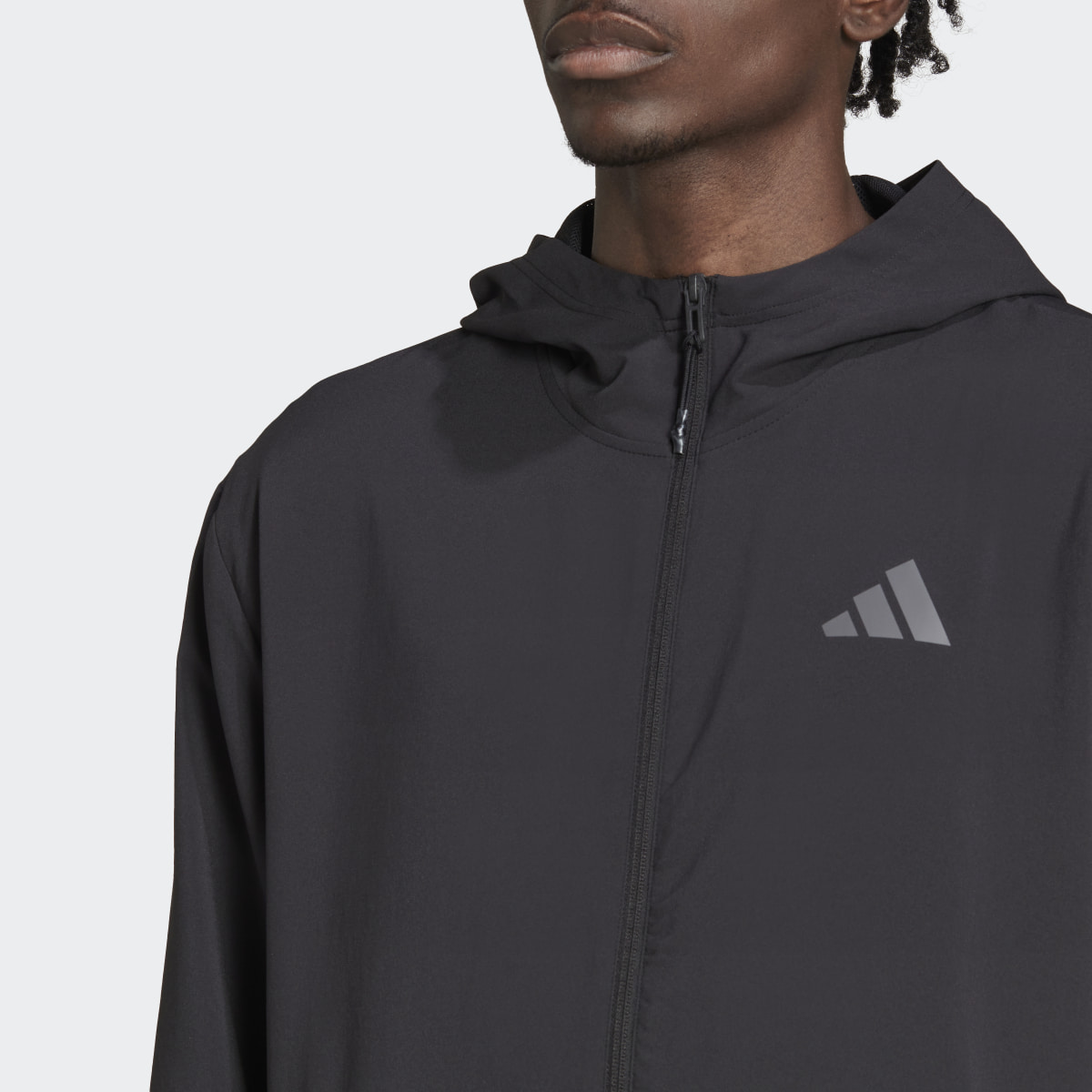 Adidas Train Essentials Seasonal Training Light Jacket. 6