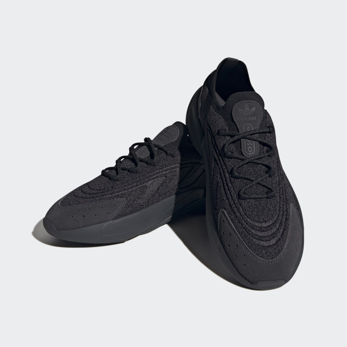 Adidas OZELIA Knit Shoes. 4