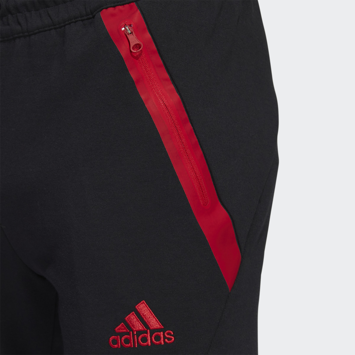 Adidas Pantaloni Travel Manchester United FC. 9