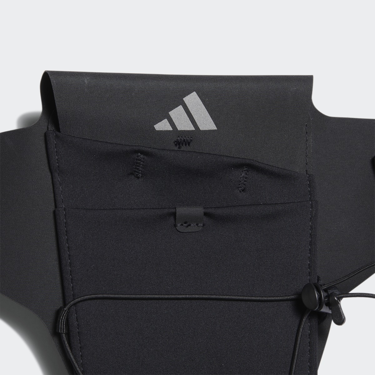 Adidas Bolsa Running Pocket. 5