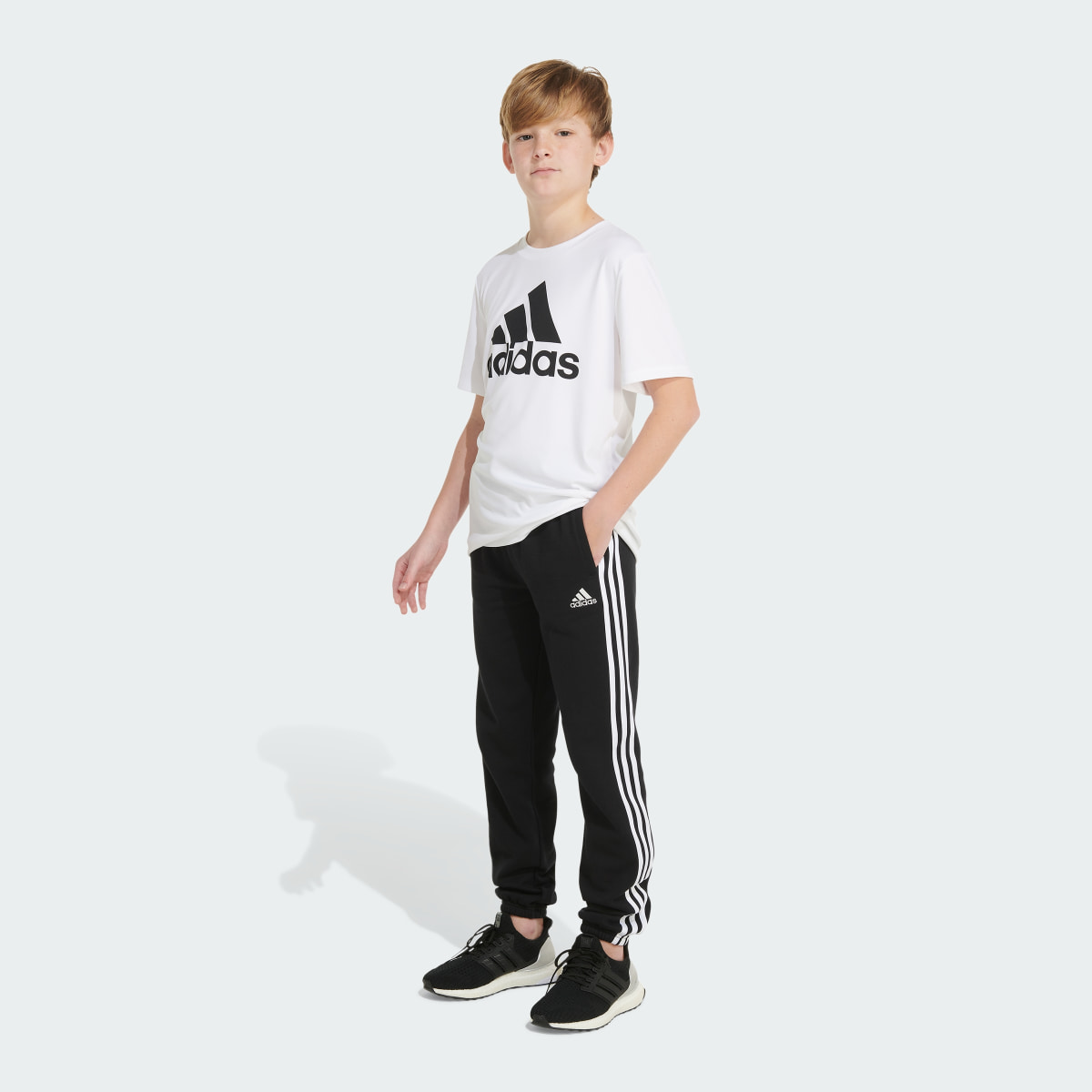 Adidas Elastic Waistband Essential 3-Stripe Fleece Jogger. 6