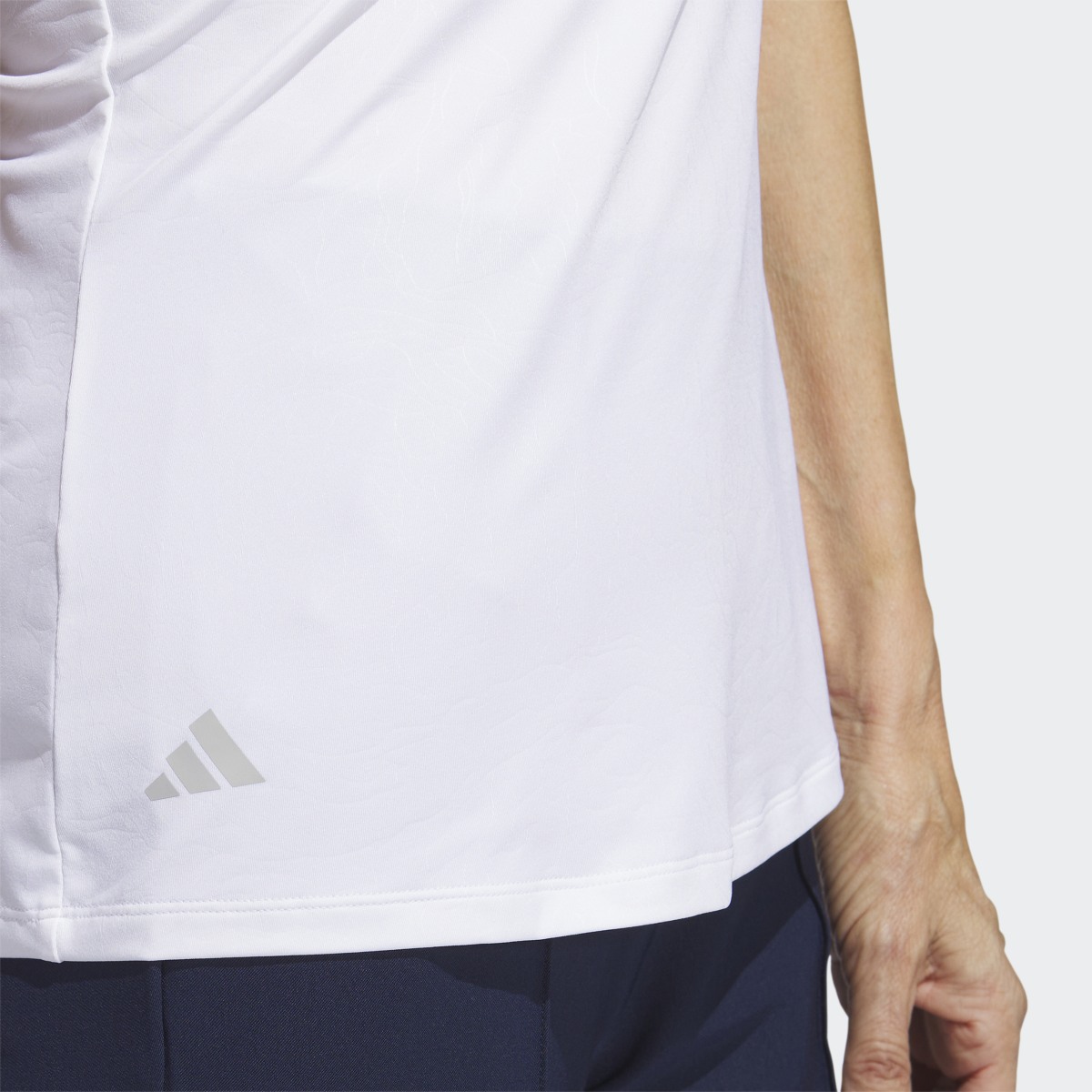 Adidas Embossed Sleeveless Poloshirt. 7