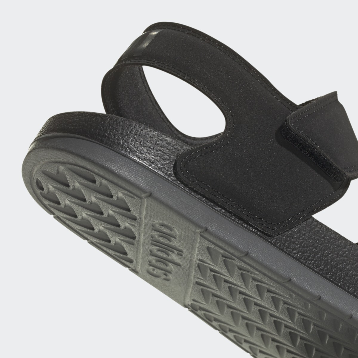 Adidas Adilette Sandals. 10