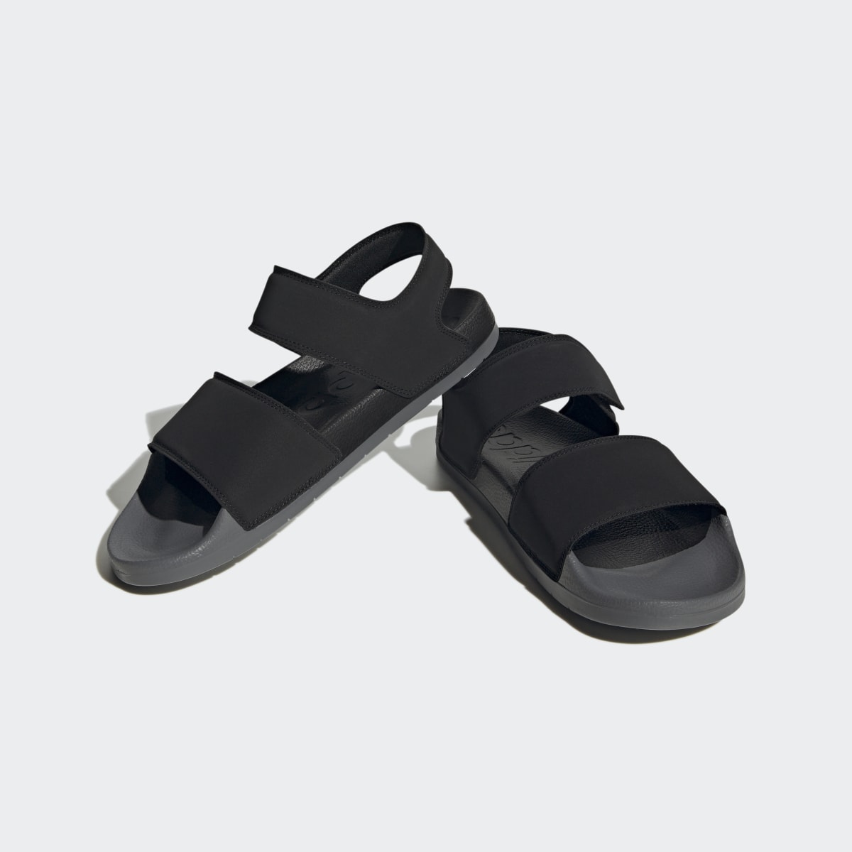 Adidas Adilette Sandals. 5