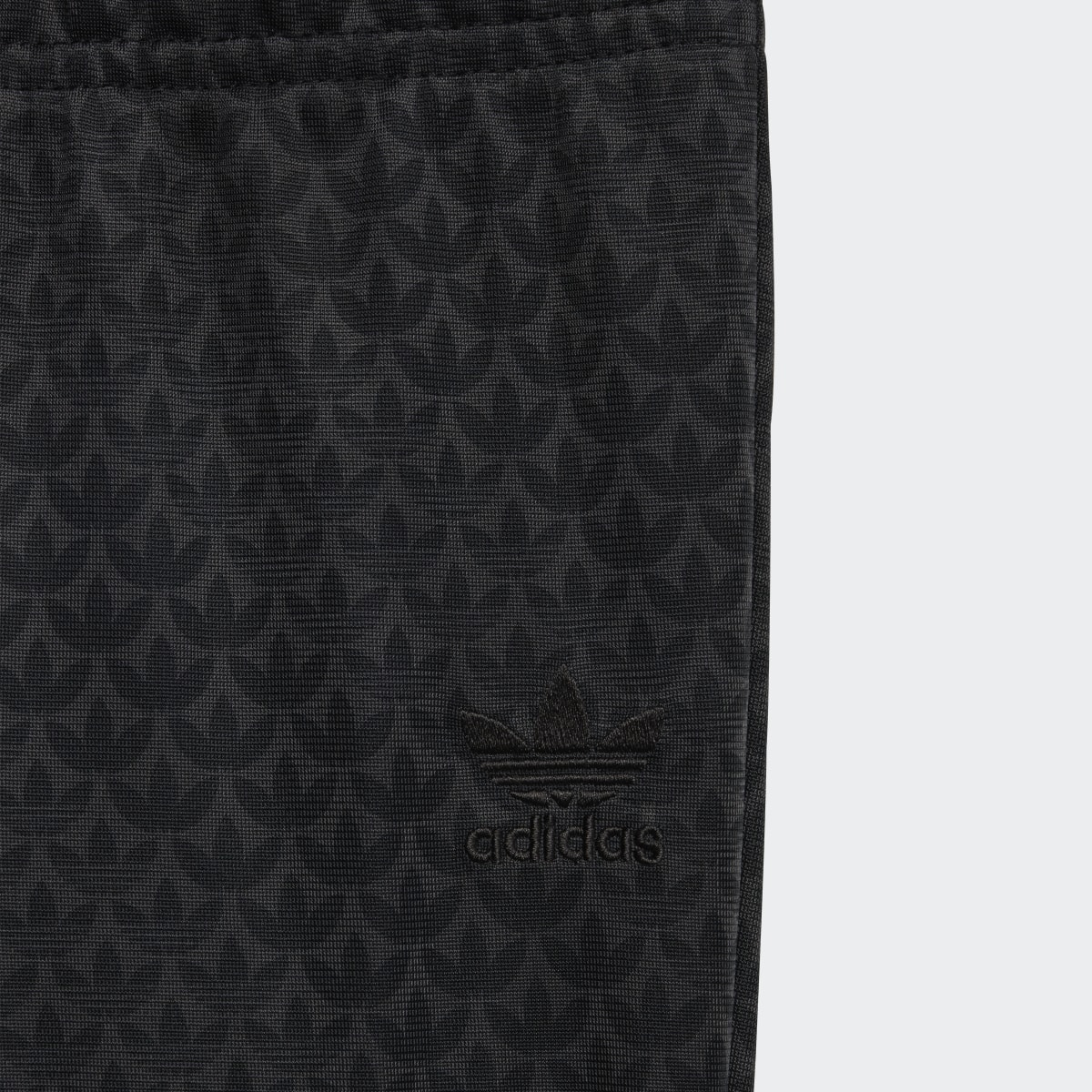 Adidas Monogram Print Track Suit. 7