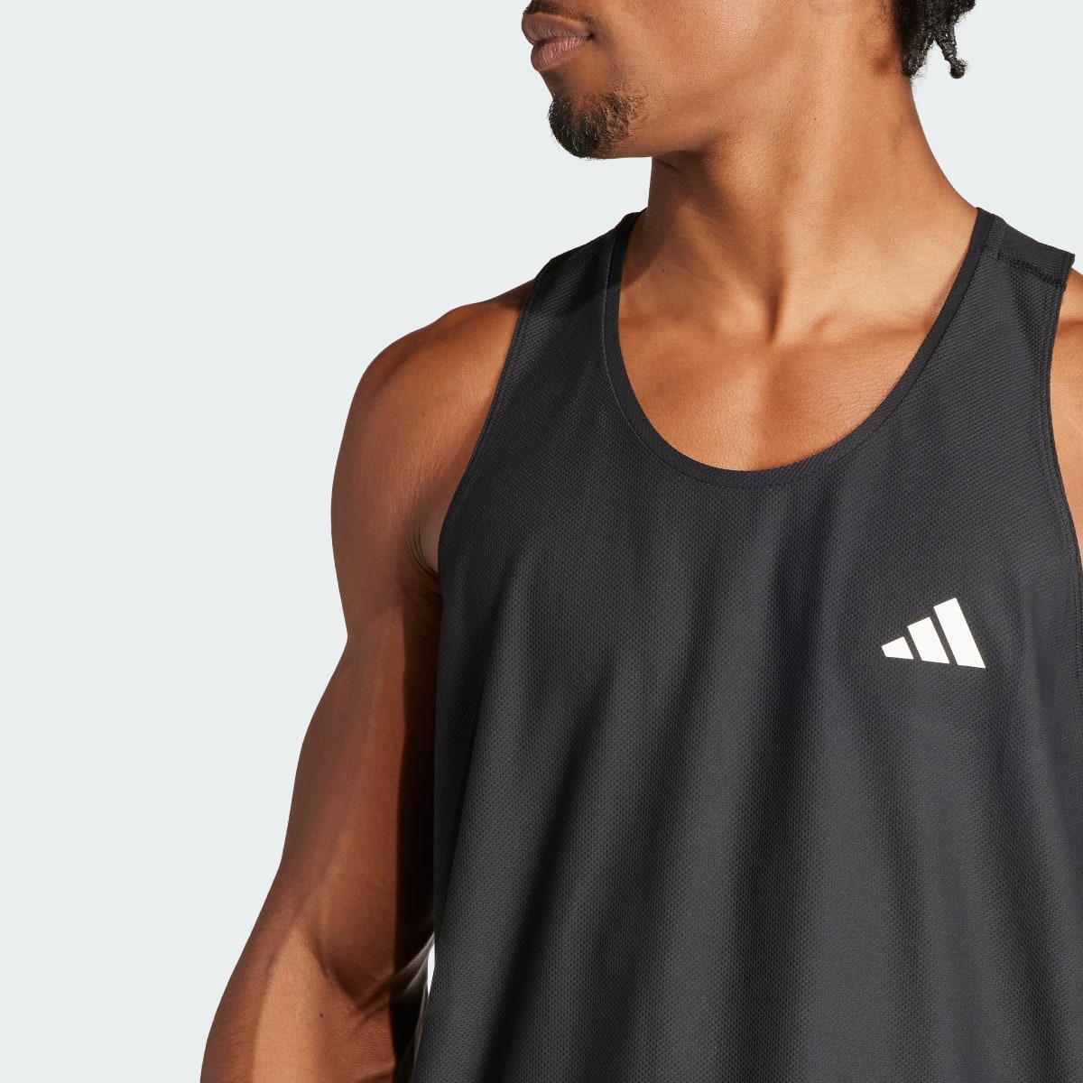 Adidas Camiseta sin mangas Own the Run. 6