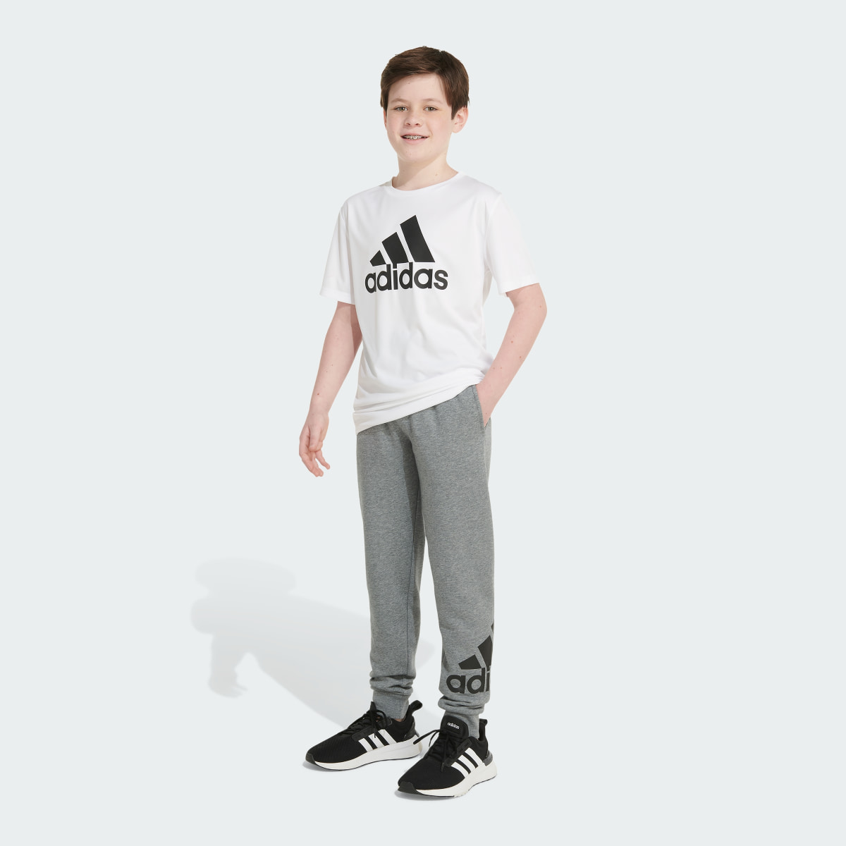 Adidas Elastic Waistband Essential 3-Stripe Fleece Jogger. 6